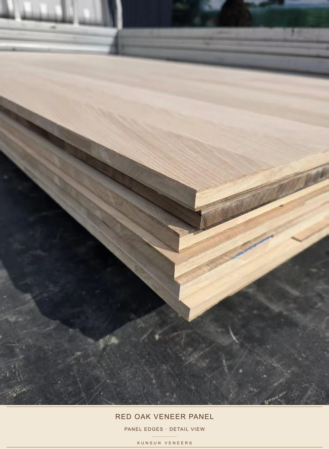 Close view of stacked red oak veneered panel edges and surface condition.